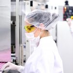 lab workers in a cleanroom
